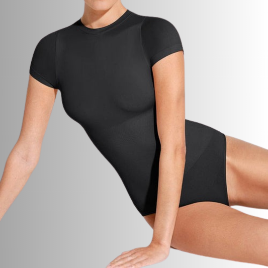 Model is 165 cm tall, weighs 51 kg, and wears size S (XS/S), with measurements: 86 cm bust, 64 cm waist, and 91 cm hips.